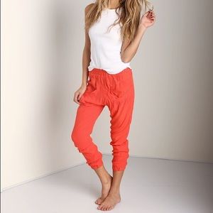 Flynn Skye Perfect Pant in orange/red in Size 1
